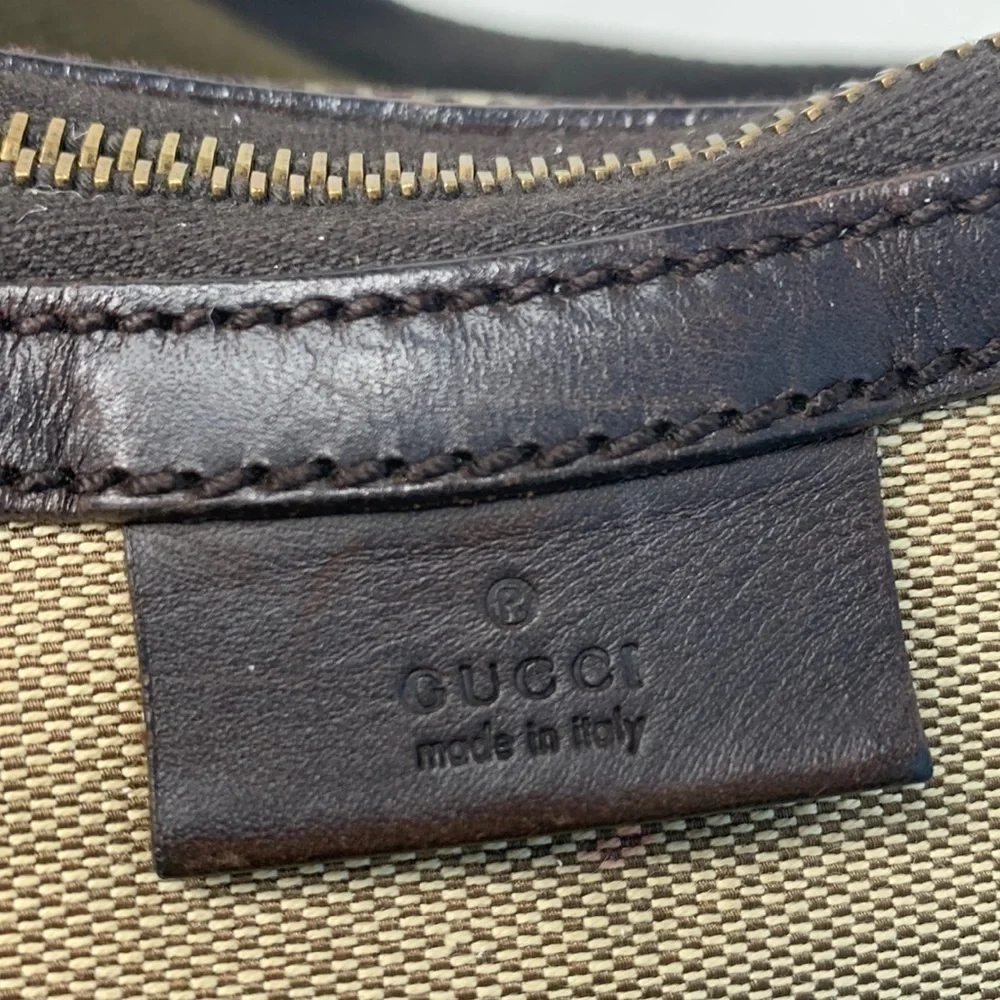 Gucci crescent handbag comes with COA